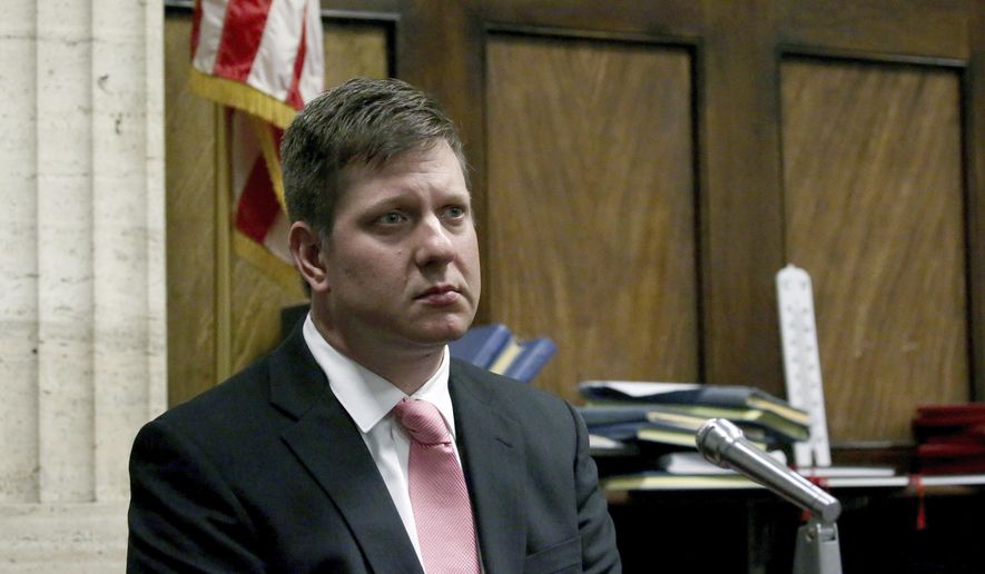 Chicago police Officer Jason Van Dyke, charged in the shooting death of black teenager Laquan McDonald, takes the witness stand during a hearing in front of Judge Vincent Gaughan Wednesday, June 28, 2017, at the Leighton Criminal Courts Building in Chicago. (Nancy Stone /Chicago Tribune via AP, Pool)