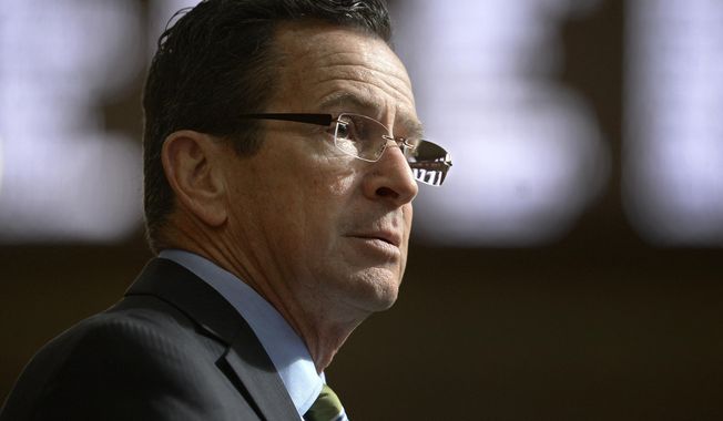 FILE- In this Feb. 8, 2017, file photo, Connecticut Gov. Dannel P. Malloy delivers his budget address to members of the house and senate inside the Hall of the House at the state Capitol in Hartford, Conn. Malloy made a last-ditch attempt Wednesday, June 28, to persuade leaders of the state House of Representatives to pass the three-month mini budget he crafted and avoid what will be deep cuts to everything from youth summer jobs and rental assistance programs. (AP Photo/Jessica Hill, File)
