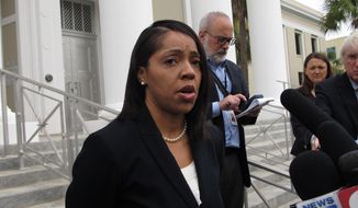 State Attorney Aramis Ayala talks to reporters after her lawyer asked the Florida Supreme Court to return 24 murders cases Gov. Rick Scott reassigned to another prosecutor because Ayala won&#39;t seek the death penalty. The court heard arguments Wednesday, June 28, 2017, in Tallahassee, Fla. (AP Photo/Brendan Farrington)
