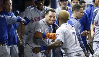 New York Mets&#39; Asdrubal Cabrera, center, and Jose Reyes (7) celebrate after Cabrera hit a home run scoring Curtis Granderson during the first inning of the team&#39;s baseball game against the Miami Marlins, Wednesday, June 28, 2017, in Miami. (AP Photo/Wilfredo Lee)