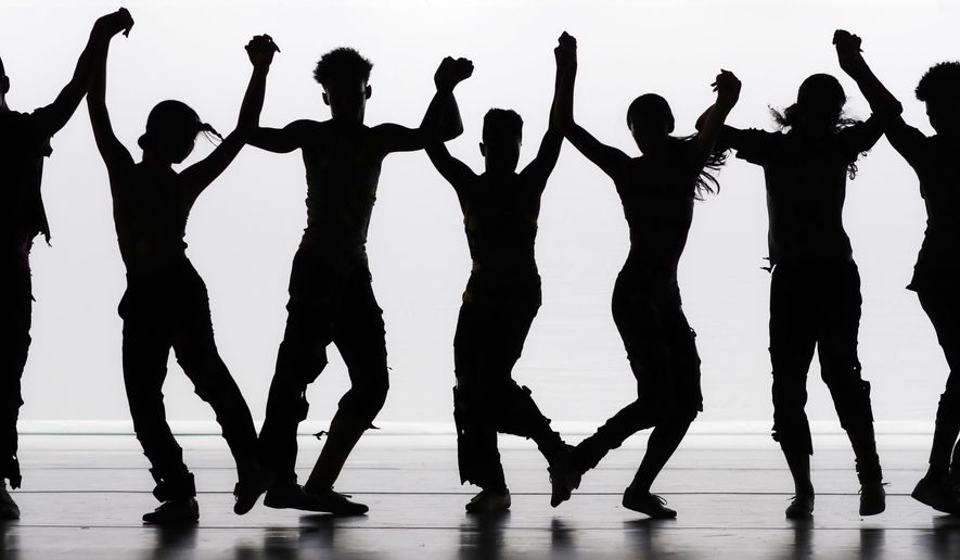 In this Thursday, June 8, 2017 photo, high school students at Ballet Tech, New York City's Public School for Dance, perform "The Jig Is Up" at the Joyce Theater. The piece was choreographed by Eliot Feld, who founded Ballet Tech to provide tuition-free dance training along with academics. (AP Photo/Mark Lennihan)
