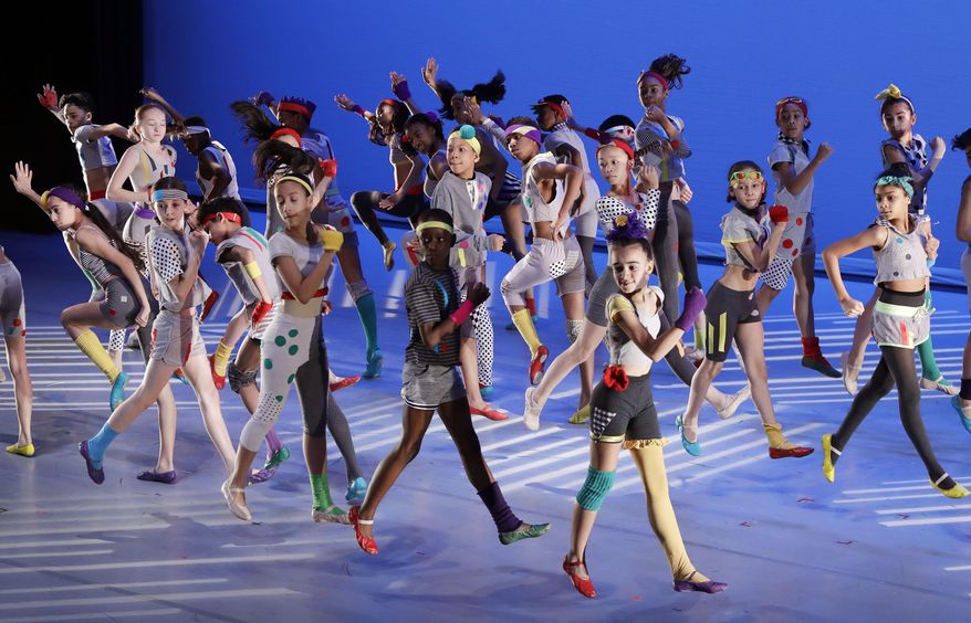 In this June 7, 2017 photo, middle school students at Ballet Tech rehearse "Meshugana Dance," the day before starting four days of performances at the Joyce Theater in New York. The school is a full-service Public School for Dance in grades 4 through 8, with about 50 fourth-graders admitted each year out of the thousands who audition. (AP Photo/Mark Lennihan)
