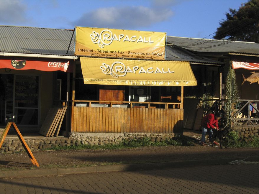 This photo provided by small business owner Mike Scanlin shows an internet cafe in the city of Hanga Roa on Easter Island. This is the only internet cafe on the island and is where Scanlin responded to all of his emails once a day. As far as Scanlin's customers knew, he was home in California, where he lived at the time, answering emails at strange hours. (Mike Scanlin via AP)