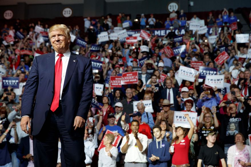 Polls and analyses were already reporting that there was media bias against the presidential hopeful, and the findings have continued. (Associated Press)