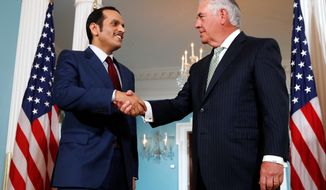 Secretary of State Rex Tillerson shakes hands with Qatari Foreign Minister Sheikh Mohammed bin Abdulrahman al-Thani Tuesday. Mr. Tillerson has tried to mediate the feud between Qatar and Saudi Arabia and suggested Saudi demands were too broad. (Associated Press)