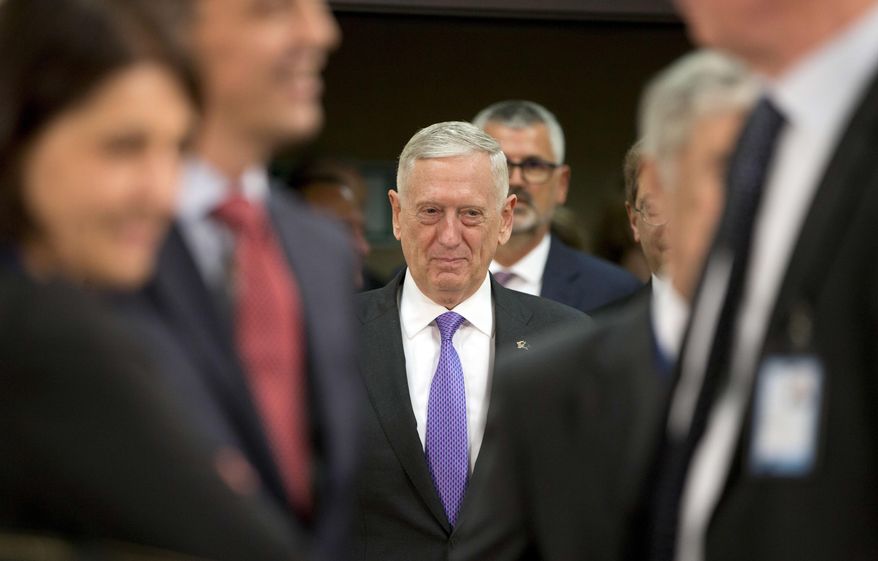 U.S. Secretary for Defense Jim Mattis, center, arrives for a meeting of NATO defense ministers at NATO headquarters in Brussels on Thursday, June 29, 2017. NATO defense ministers met Thursday to discuss, among other issues, the situation in Afghanistan and defense spending. (AP Photo/Virginia Mayo)