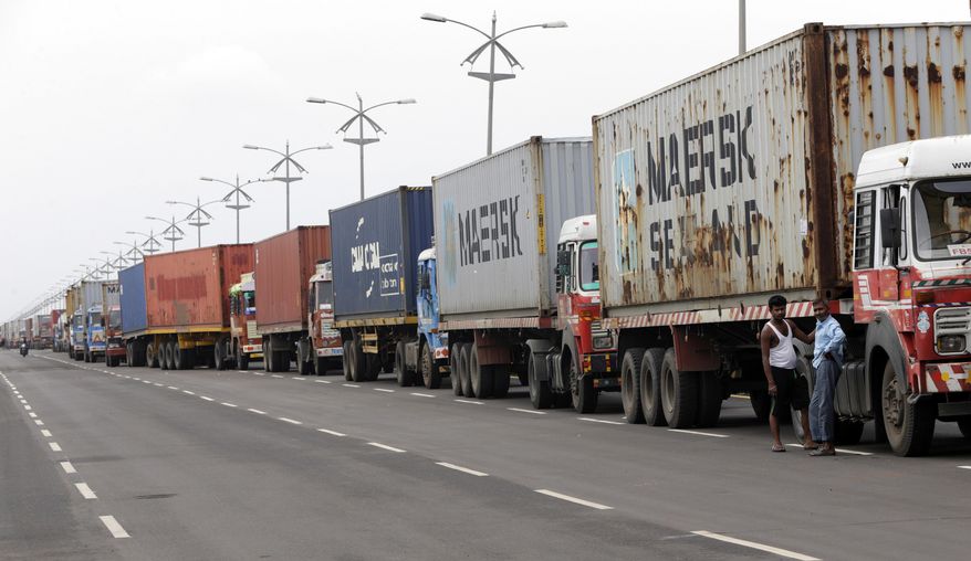 Trucks loaded with containers are lined up outside a terminal at the Jawaharlal Nehru Port Trust in Mumbai, India, Thursday, June 29, 2017. Operations at a terminal at India&#39;s busiest container port have been stalled by the malicious software that suddenly burst across the world’s computer screens Tuesday, another example of the disruption that continues to be felt globally. (AP Photo/Rajanish Kakade)