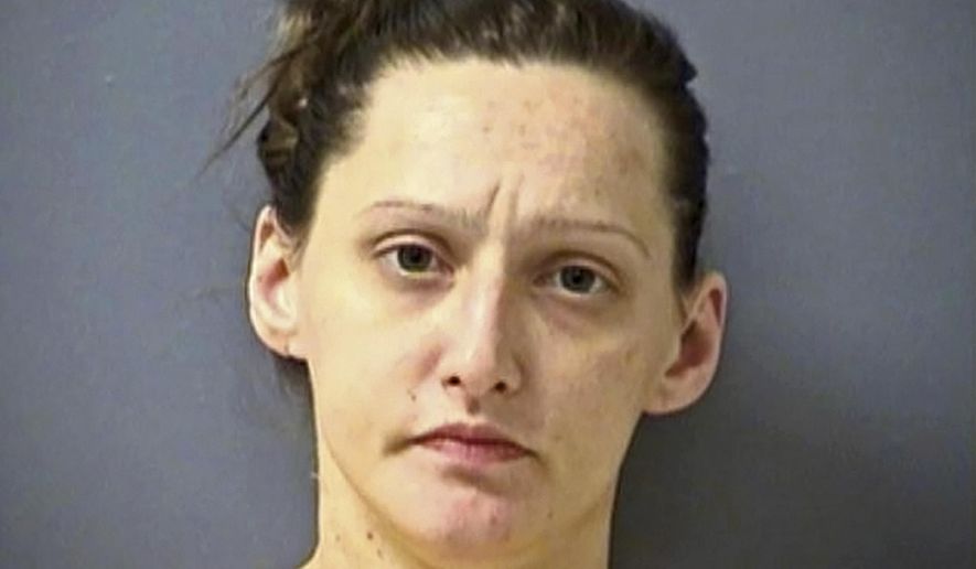 This undated photo provided by the Butler County Prison in Butler, Pa., shows Kasey Dischman of Evans City, Pa., arraigned Wednesday, June 28, 2017, on a single first-degree felony count of aggravated assault on an unborn child and sent to the Butler County jail, unable to post $500,000 bond. Authorities say Dischman, roughly seven months pregnant, overdosed on heroin June 23, 2017, causing doctors to deliver Dischman's infant girl using a premature cesarean section the next day. Police say the baby "is now on life support and will have lasting injuries," without describing them. Dischman spent much of her pregnancy in the same jail, about 30 miles north of Pittsburgh, for retail theft before she was released about five days before the overdose. (Butler County Prison via AP)