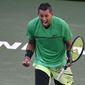 FILE - In this March 15, 2017, file photo, Nick Kyrgios, of Australia, celebrates after beating Novak Djokovic, of Serbia, at the BNP Paribas Open tennis tournament, in Indian Wells, Calif. Roger Federer, Novak Djokovic, Rafael Nadal and Andy Murray have combined to win the past 14 Wimbledon men&#39;s titles. Kyrgios  is one of those who could possibly break that run of dominance at the All England Club, where play begins Monday.(AP Photo/Mark J. Terrill)