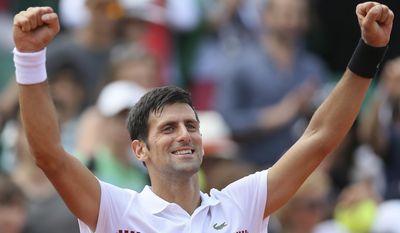 FILE - In this May 31, 2017, file photo, Serbia's Novak Djokovic celebrates after defeating Portugal's Joao Sousa during their second round match of the French Open tennis tournament at the Roland Garros Stadium, in Paris. Novak Djokovic has won three Wimbledon titles and normally would be considered a real likely candidate for a fourth, but he has not played up to his usual standards over the past year. (AP Photo/David Vincent, File)