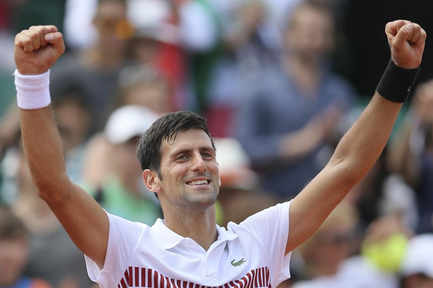 FILE - In this May 31, 2017, file photo, Serbia's Novak Djokovic celebrates after defeating Portugal's Joao Sousa during their second round match of the French Open tennis tournament at the Roland Garros Stadium, in Paris. Novak Djokovic has won three Wimbledon titles and normally would be considered a real likely candidate for a fourth, but he has not played up to his usual standards over the past year. (AP Photo/David Vincent, File)