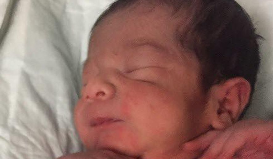 This photo provided the Annapolis Police Department shows a newborn baby found in Annapolis, Md., Friday, June 30, 2017. Police in Maryland's capital city say the newborn boy found outside a home seems to be in good health. (Annapolis Police Department via AP)