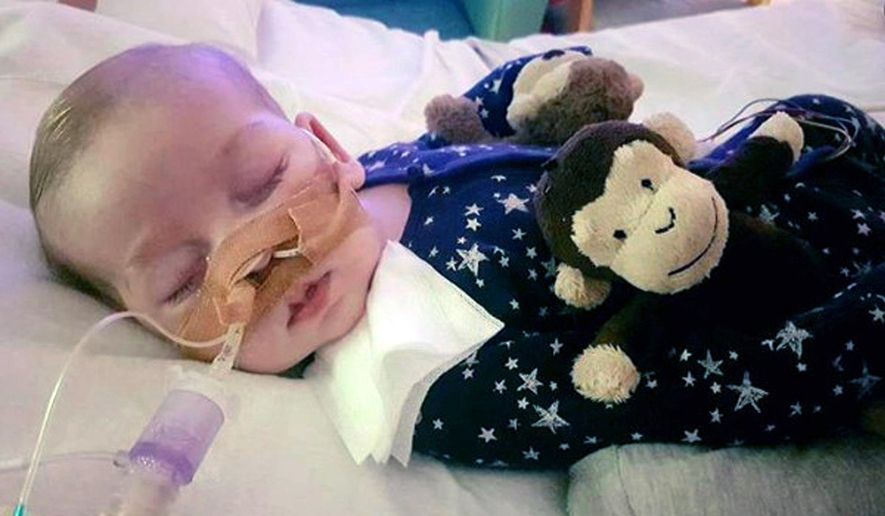 This is an undated hand out photo of Charlie Gard provided by his family, at Great Ormond Street Hospital, in London. The parents of a terminally ill baby boy lost the final stage of their legal battle on Tuesday, June 27, 2017, to take him out of a British hospital to receive treatment in the U.S., after a European court agreed with previous rulings that the baby should be taken off life support. (Family of Charlie Gard via AP)