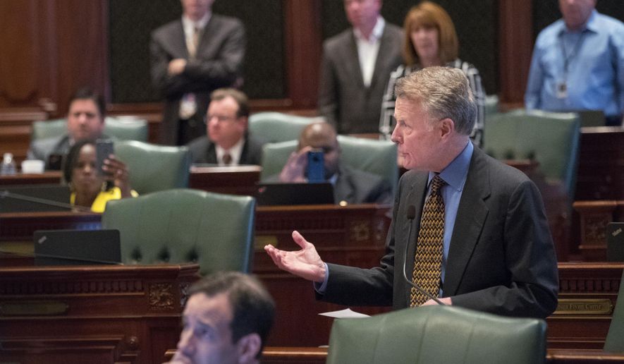 Illinois House Speaker Michael Madigan, D-Chicago, thanks House members following a vote to adopt a spending bill amendment in Springfield, Ill., on Friday, June 30, 2017. Madigan said more work needs to be done, including final negotiations on a tax increase package that is needed to ensure the budget will be in balance. (Ted Schurter/The State Journal-Register via AP)