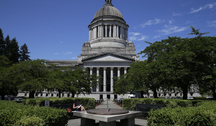 The Legislative Building is shown Friday, June 30, 2017, at the Capitol in Olympia, Wash. Details of a new two-year state operating budget were released Friday, the same day Washington lawmakers must vote on the plan in order to prevent a partial government shutdown. (AP Photo/Ted S. Warren)