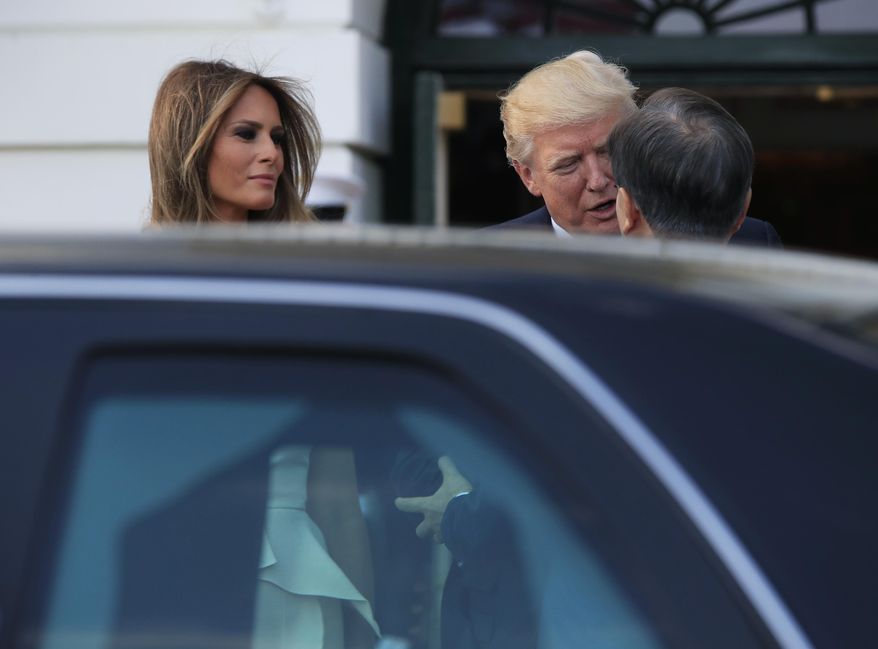 President Donald Trump and first lady Melania Trump welcome South Korean President Moon Jae-in and his wife Kim Jung-sook on the South Portico at the White House in Washington, Thursday, June 29, 2017. (AP Photo/Manuel Balce Ceneta)