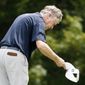 Michael Allen tips his visor and bows after making a birdie on the 17th hole during the second round of the U.S. Senior Open golf tournament, Friday, June 30, 2017, in Peabody, Mass. (AP Photo/Michael Dwyer)