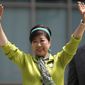 In this Thursday, June 29, 2017 photo, Tokyo Gov. Yuriko Koike waves to a crowd during her “Tomin (Tokyoites) First” party&#39;s campaign rally for Tokyo Metropolitan Assembly election in Tokyo. Tokyo residents were voting for the city&#39;s assembly in an election Sunday, July 2,  2017, that could alter national politics as the populist governor Koike aims to strengthen her base and challenge Prime Minister Shinzo Abe&#39;s scandal-laden ruling party.   (AP Photo/Shuji Kajiyama)