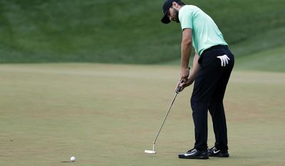 Kyle Stanley sinks the winning putt on the 18th green of the playoff, during the Quicken Loans National golf tournament, Sunday, July 2, 2017, in Potomac, Md. (AP Photo/Alex Brandon)