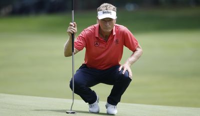 Bernhard Langer, of Germany, reads the green on the second hole during the third round of the U.S. Senior Open golf tournament, Saturday, July 1, 2017, in Peabody, Mass. (AP Photo/Michael Dwyer)