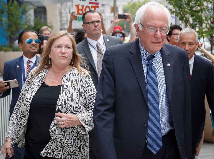 Sen. Bernard Sanders and wife Jane O'Meara Sanders hired lawyers in light of investigations into the finances of now-defunct Burlington College, which closed last year due, some believe, to debts incurred during Mrs. Sanders' tenure. (ASSOCIATED PRESS)