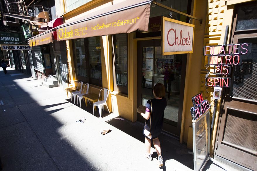 This June 20, 2017 photo shows Chloe's Soft Serve Fruit Co., a vegan scoop shop in New York. Started by a fro-yo addict looking for a healthier choice, the shop in Manhattan's bustling Union Square uses only fruit, water and a touch of organic cane sugar to blend up creamy frozen treats like dark chocolate and pumpkin. Chloe's opened its first shop in 2010, and now sells frozen pops in supermarkets and to hospitals, schools and hotels. (AP Photo/Michael Noble Jr.)