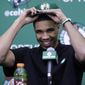 FILE - This June 23, 2017 file photo shows Boston Celtics first-round draft pick Jayson Tatum at the team&#39;s practice facility in Waltham, Mass. NBA Summer League rosters are typically full of rookies getting their first taste of the league or other players young in their career trying to catch on with a roster. The Utah Summer League will open with the most anticipated game of the three-day session. The 76ers and No. 1 pick Markelle Fultz face Tatum and the Celtics in the first game Monday. (AP Photo/Charles Krupa, file)