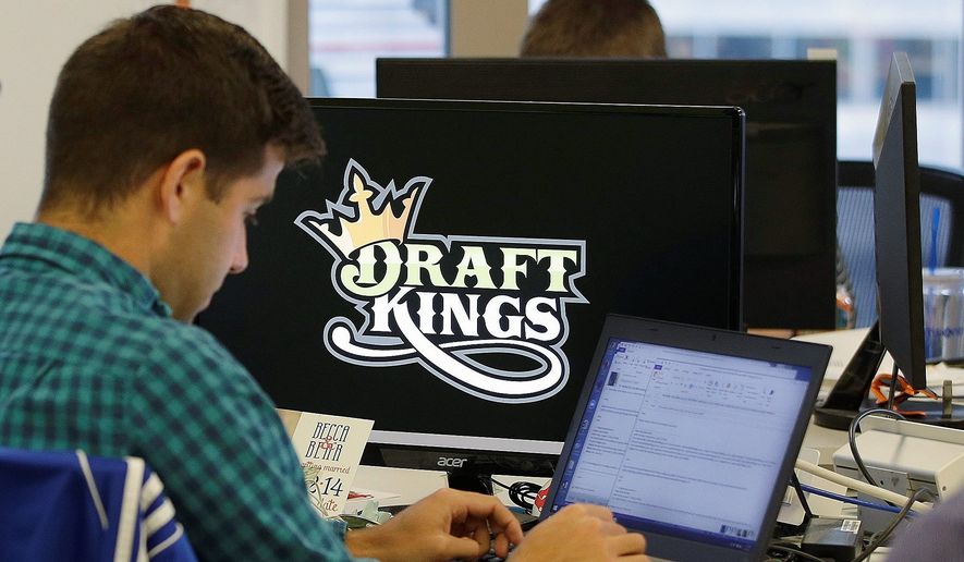 Online fantasy sports brokers FanDuel and DraftKings proposed to merge, but the union has been blocked over antitrust concerns. (Associated Press)