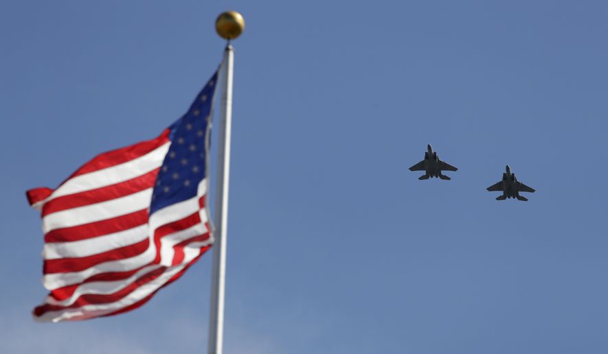 The Oregon Air National Guard conducts an F-15 flyover during the opening ceremonies at the Olympic Track and Field Trials, Friday, July 1, 2016, in Eugene Ore. (AP Photo/Charlie Riedel)