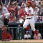 Washington Nationals&#39; Bryce Harper, right, comes in to score on a double by Daniel Murphy as New York Mets catcher Rene Rivera, left, looks on during the eighth inning of a baseball game, Tuesday, July 4, 2017, in Washington. The Nationals won 11-4. (AP Photo/Nick Wass)