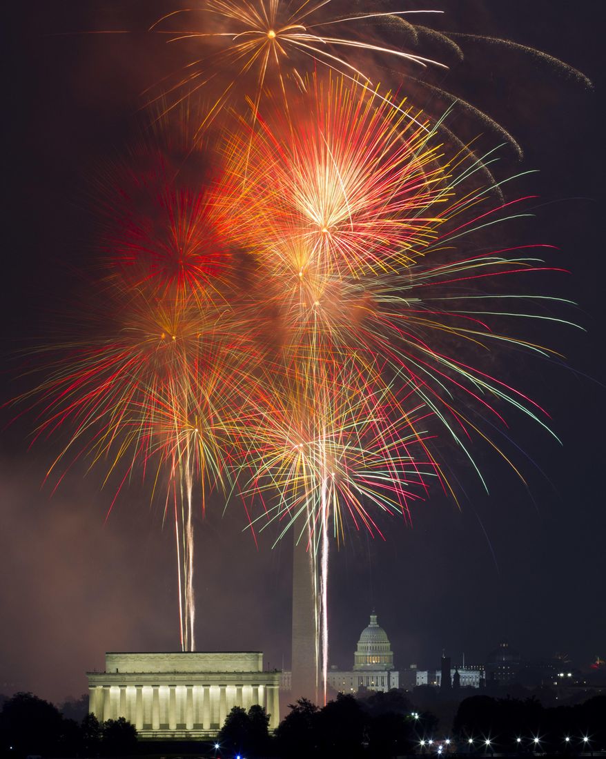 Fireworks explode over the Lincoln Memorial, left, Washington Monument, center, and U.S. Capitol, at the National Mall in Washington, Tuesday, July 4, 2017, during the Fourth of July celebration. (AP Photo/Jose Luis Magana)