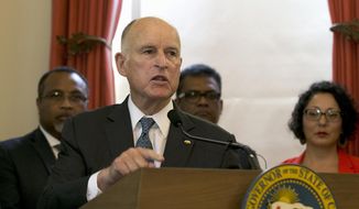 FILE - In this Tuesday, June 13, 2017, file photo, California Gov. Jerry Brown discusses climate change at a news conference in Sacramento, Calif. Brown, lawmakers, business groups and environmentalists are working to reach a deal on extending cap and trade, California’s landmark program aimed at slowing global warming. If a deal is inked, the Legislature can take a vote next Monday, July 10, before Democratic Assemblymen Jimmy Gomez heads to Congress on July 11 and takes a reliable vote for cap-and-trade with him. (AP Photo/Rich Pedroncelli, File)