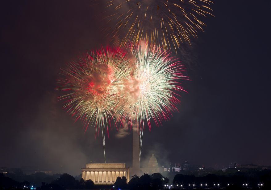 Fireworks explode over the Lincoln Memorial, left, Washington Monument, center, and U.S. Capitol, at the National Mall in Washington, Tuesday, July 4, 2017, during the Fourth of July celebration. (AP Photo/Jose Luis Magana)