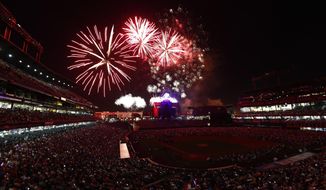 Fireworks explode over Coors Field during an Independence Day celebration after the Colorado Rockies hosted the Cincinnati Reds in a baseball game Tuesday, July 4, 2017, in Denver. The Reds won 8-1. (AP Photo/David Zalubowski)