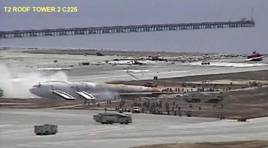 In this July 6, 2013, image made from a San Francisco International Airport video, passengers stand outside Asiana flight 214 after it crashed at the airport in San Francisco. The video shows the fiery 2013 crash of a commercial airliner on approach at San Francisco International Airport. (San Francisco International Airport via AP)