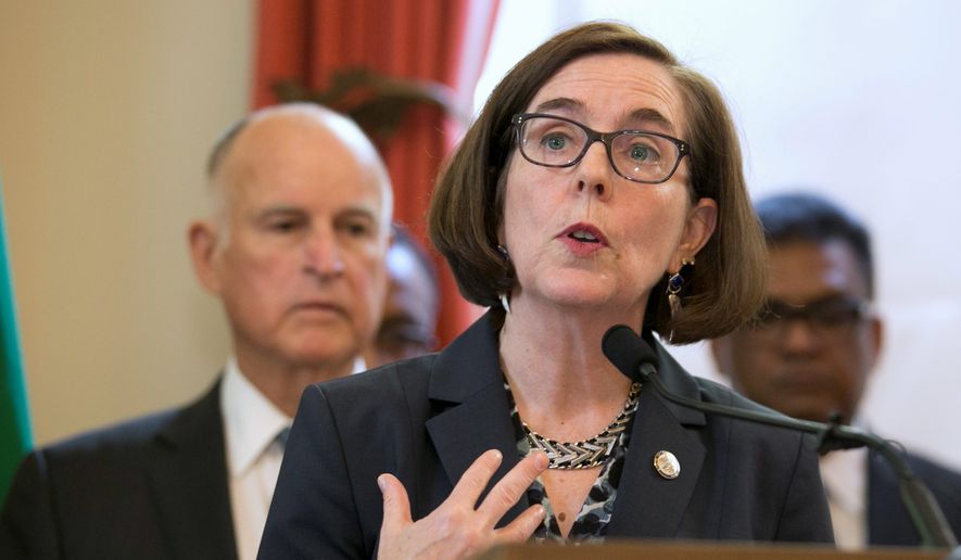 Oregon Gov. Kate Brown backs a bill requiring insurers to provide free abortions. &quot;The ability to control our bodies and make informed decisions about health are critical to providing all Oregonians the opportunity to achieve our full potential,&quot; she said. (Associated Press) **FILE**
