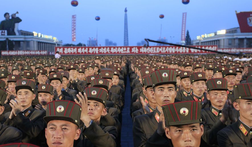 Soldiers gather in Kim Il Sung Square in Pyongyang, North Korea,Thursday, July 6, 2017, to celebrate the test launch of North Korea&#39;s first intercontinental ballistic missile two days earlier. The North&#39;s ICBM launch, its most successful missile test to date, has stoked security worries in Washington, Seoul and Tokyo as it showed the country could eventually perfect a reliable nuclear missile capable of reaching anywhere in the United States. Analysts say the missile tested Tuesday could reach Alaska if launched at a normal trajectory. (AP Photo/Jon Chol Jin)