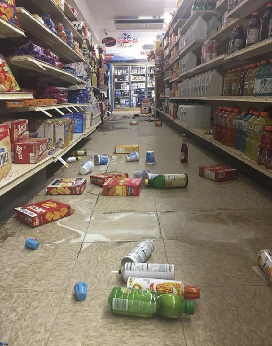 In this image provided by KTVH-TV, groceries litter the floor at the D&D Foodtown in Lincoln, Mont., after a series of earthquakes Thursday, July 6, 2017. The U.S. Geological Survey received reports from people who felt the quake throughout Montana and into Idaho, Washington, Wyoming and Canada. There were no reports of injuries. (Mikenzie Frost/KTVH-TV via AP)
