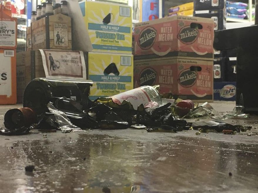 This image provided by KTVH-TV, shows damage at the D&D Foodtown in Lincoln, Mont., after a series of earthquakes Thursday, July 6, 2017. The U.S. Geological Survey received reports from people who felt the quake throughout Montana and into Idaho, Washington, Wyoming and Canada. There were no reports of injuries. (Mikenzie Frost/KTVH-TV via AP)