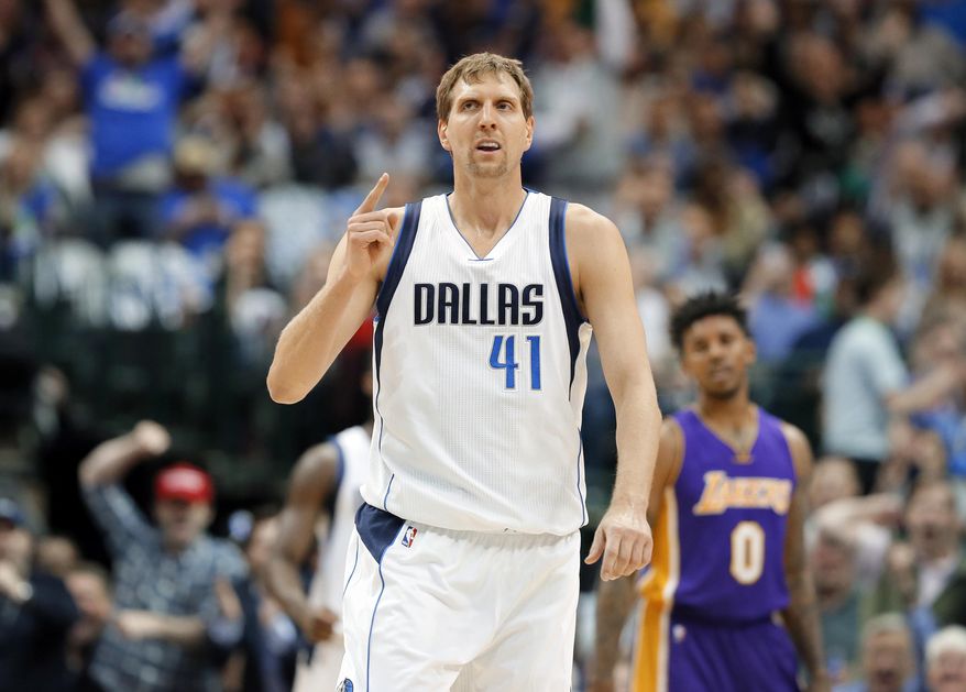 FILE- In this March 7, 2017, file photo, Dallas Mavericks forward Dirk Nowitzki, of Germany, celebrates sinking a three-point basket early in the first quarter of an NBA basketball game against the Los Angeles Lakers in Dallas. A person with knowledge of the agreement says the Dallas Mavericks and Dirk Nowitzki have agreed on a two-year, $10 million deal that assures a 20th season for the star forward.  The second year of the contract carries a team option, the person told The Associated Press, Thursday, July 6, 2017, on condition of anonymity because the team hasn&#39;t announced the deal. The 39-year-old Nowitzki is set to join Kobe Bryant of the Lakers as the only players to spend 20 seasons with one franchise. (AP Photo/Tony Gutierrez, File)
