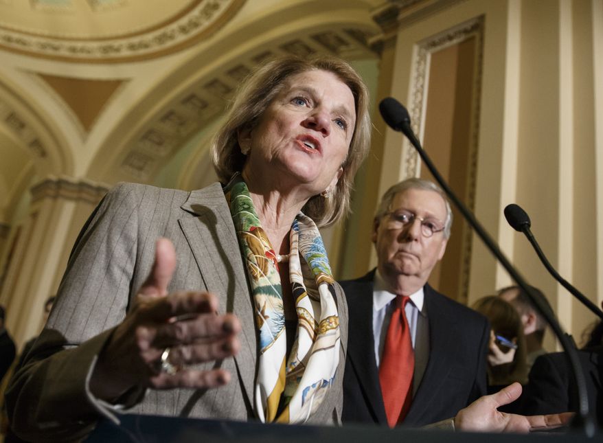 In this Jan. 20, 2015 photo, Sen. Shelley Moore Capito, R-W.Va., accompanied by Senate Majority Leader Mitch McConnell of Ky., speaks during a news conference on Capitol Hill in Washington. West Virginia likes to say it&#39;s &quot;Almost Heaven.&quot; Less idyllic is the spot its Republican senator, Shelley Moore Capito, is in as she decides whether to back her party&#39;s effort to repeal and replace Democrat Barack Obama&#39;s health care law. (AP Photo/J. Scott Applewhite, File)