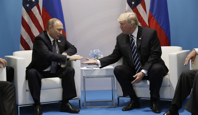 President Donald Trump meets with Russian President Vladimir Putin at the G20 Summit, Friday, July 7, 2017, in Hamburg. (AP Photo/Evan Vucci)