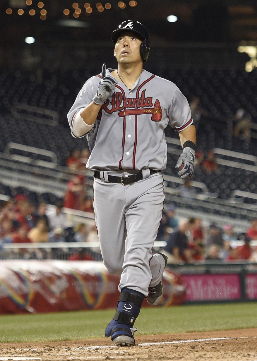 Atlanta Braves' Kurt Suzuki celebrates his home during the sixth inning of the team's baseball game against the Washington Nationals, Thursday, July 6, 2017, in Washington. The Braves won 5-2. (AP Photo/Nick Wass)