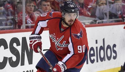FILE - In this March 14, 2017, file photo, Washington Capitals left wing Marcus Johansson (90), of Sweden, skates during the second period of an NHL hockey game against the Minnesota Wild in Washington. After being surprised on Sunday by a deal that sent him to the Devils for two draft picks in 2018, Johansson on Friday, July 7, 2017,  said he is looking forward to the chance to play for a rebuilding franchise that finished at the bottom of the Eastern Conference this past season. (AP Photo/Nick Wass, File)