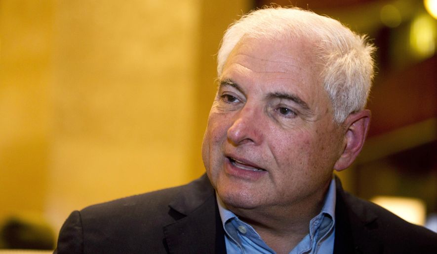 FILE - In this Jan. 28, 2015 file photo, Panama's former President Ricardo Martinelli answers questions during an interview at a hotel in Guatemala City. A U.S. federal judge in Florida denied bond on Friday, July 7, 2017 for the former Panamanian president who is fighting efforts to send him back to his home country to face political espionage charges. (AP Photo/Moises Castillo, File)