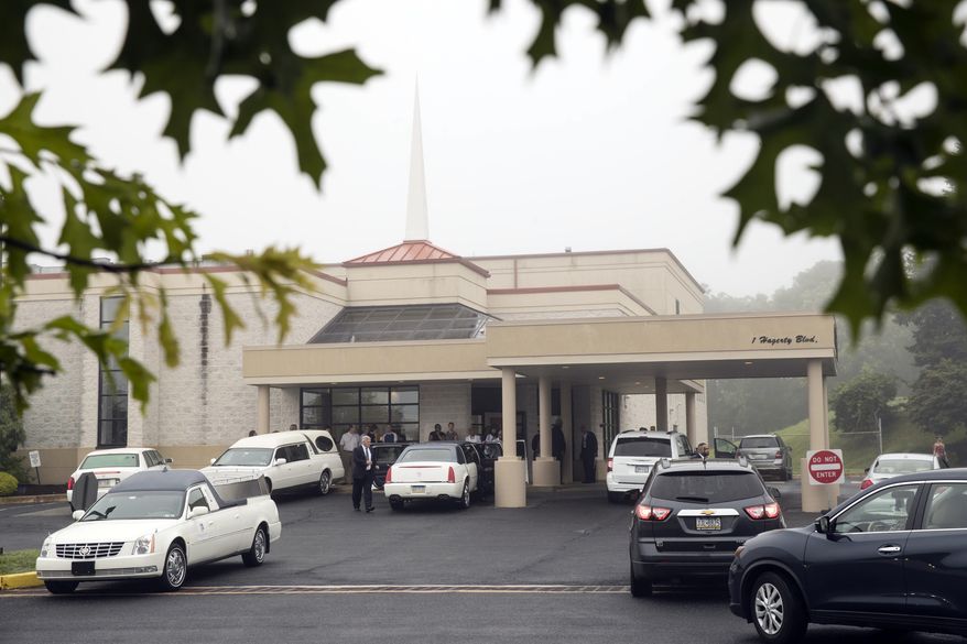 People gather for 18-year-old Bianca Roberson's viewing and funeral at St. Paul's Baptist Church in West Chester, Pa., Friday, July 7, 2017. A man driving down a Pennsylvania highway shot the recent high school graduate in the head, killing her, as the two tried to merge into a single lane, authorities said. (AP Photo/Matt Rourke)