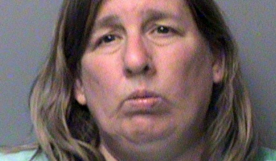 This undated photo provided by the Polk County Sheriff's Department shows Terri Rote in Polk County, Iowa. Rote who was charged with voting twice for Donald Trump last fall has pleaded guilty to election misconduct and is scheduled to be sentenced next month. Court records show Terri Lynn Rote entered a plea on June 27, 2017, to the felony charge in district court in Des Moines (Polk County Sheriff's Department via AP, File)