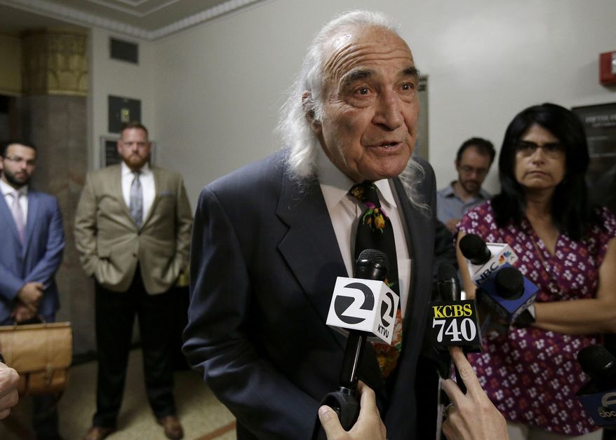 Attorney Tony Serra, representing Derick Ion Almena, speaks to reporters at a courthouse in Oakland, Calif., Friday, July 7, 2017. Almena and Max Harris, the two men each charged with 36 counts of involuntary manslaughter for the December Oakland warehouse fire that killed three dozen people attending a dance party, did not enter pleas on Friday. (AP Photo/Jeff Chiu)