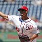 Washington Nationals starting pitcher Joe Ross throws during the first inning of a baseball game against the Atlanta Braves at Nationals Park, Sunday, July 9, 2017, in Washington. (AP Photo/Alex Brandon)