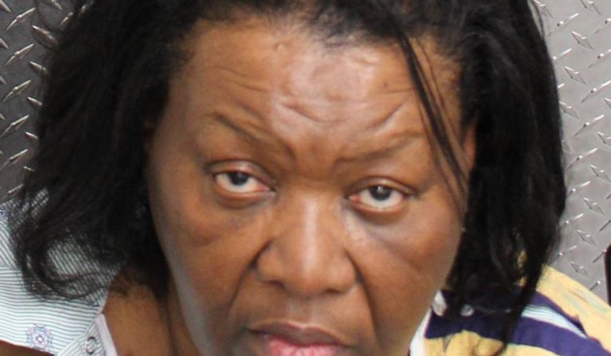 This July 7, 2017 booking photo provided by Orange County Corrections shows Callene Barton after she was arrested in Orlando, Fla. Orange County sheriff's investigators say 3-year-old Xavier Mokarzel-Satchel, was killed by his mother's roommates, Barton and and her daughter Lakesha Lewis, because he drank milk from a jug. Lewis, 28, and her mother, Barton, 58, have each been charged with first-degree murder in the death of Xavier Mokarzel-Satchel, according to an arrest affidavit from the Orange County Sheriff's Office. (Orange County Incarcerations via AP)